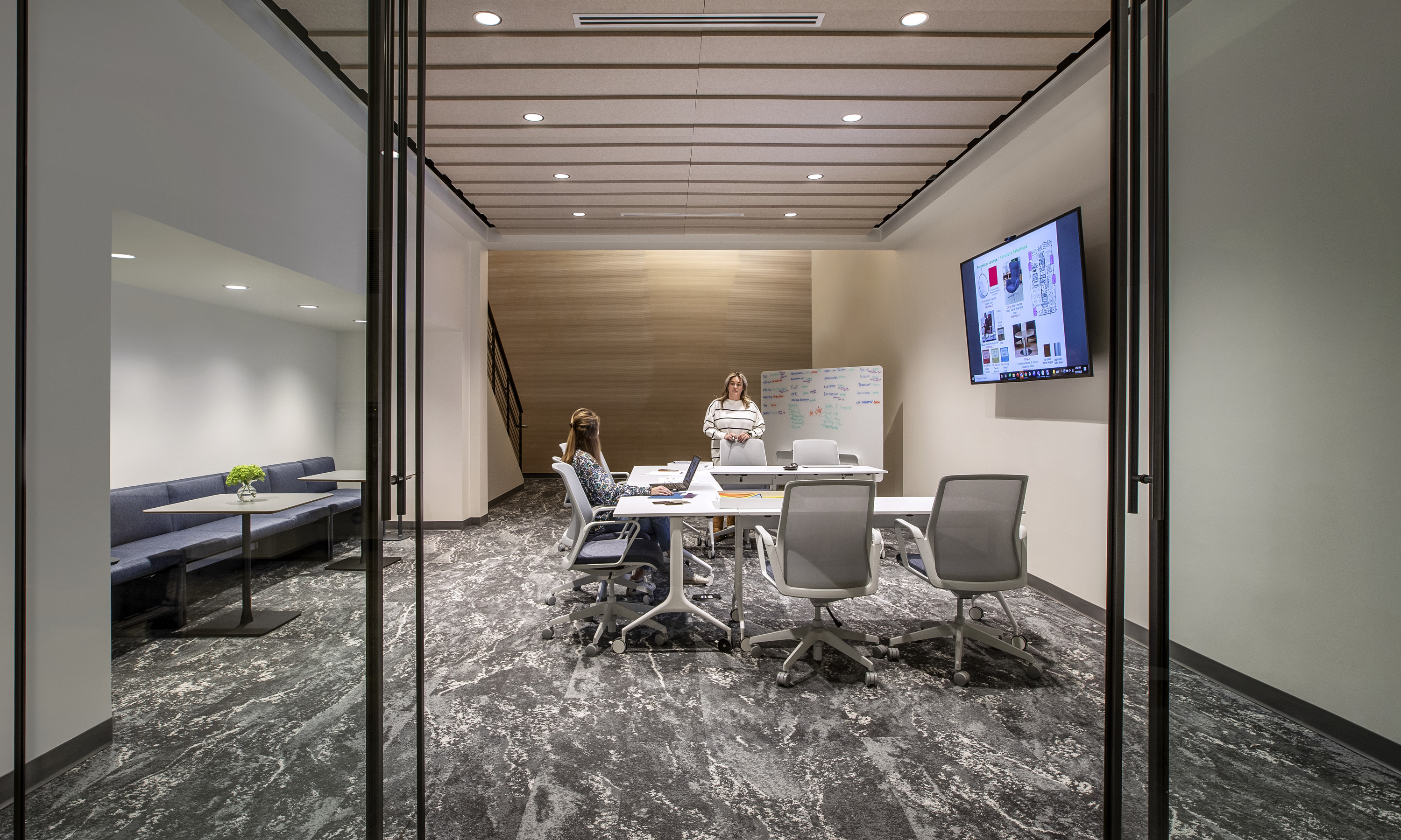 White MYNE Mobile tables in training space.