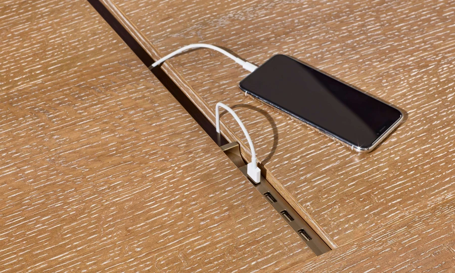 https://www.nucraft.com/images/banners/Preston_Community_Table__Flaky_Oak_Sliding_USB.jpg