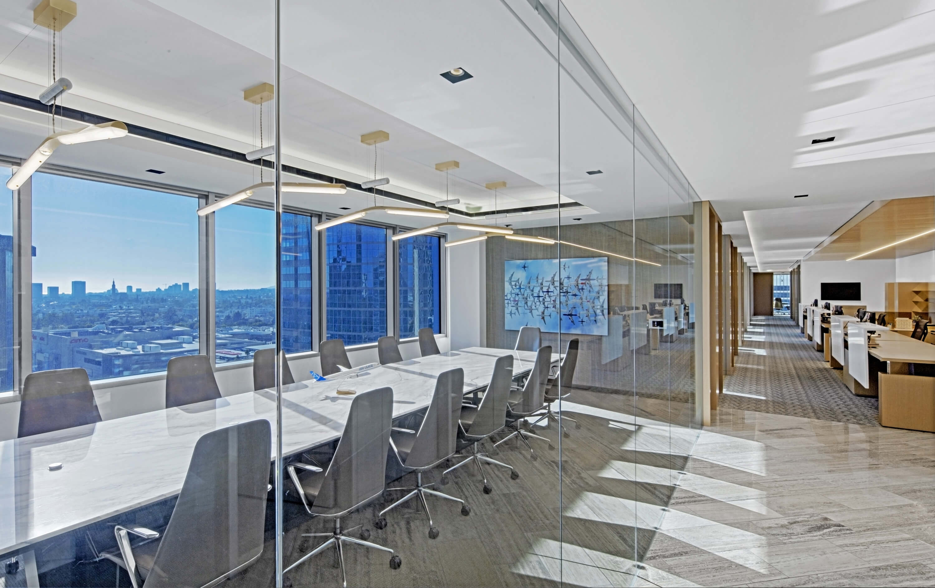 Stone top Crossbeam conference table at Airlease Headquarters. Crossbeam was designed by Lauren Rottet.