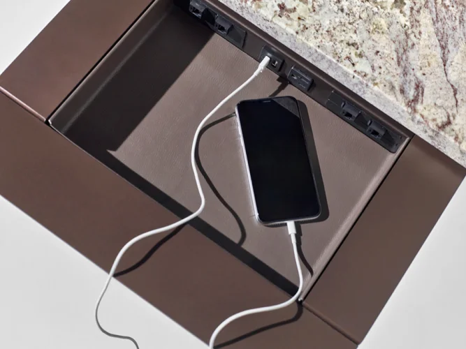 <p>Discreetly incorporated into the subtop of the table, Power Drawers provide convenient yet covert access to power and AV.</p>