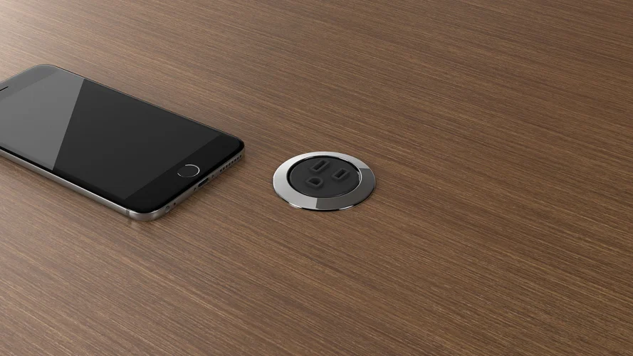 <p>This compact unit allows for the addition of power to a work surface in a discreet way. </p>