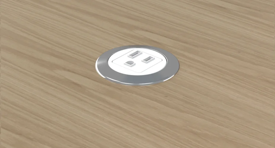 <p>This compact unit allows for the addition of power to a work surface in a discreet way. </p>