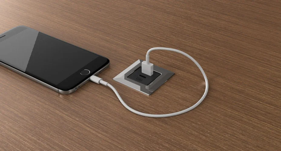 <p>This compact unit allows for the addition of power to a work surface in a discreet way. </p>