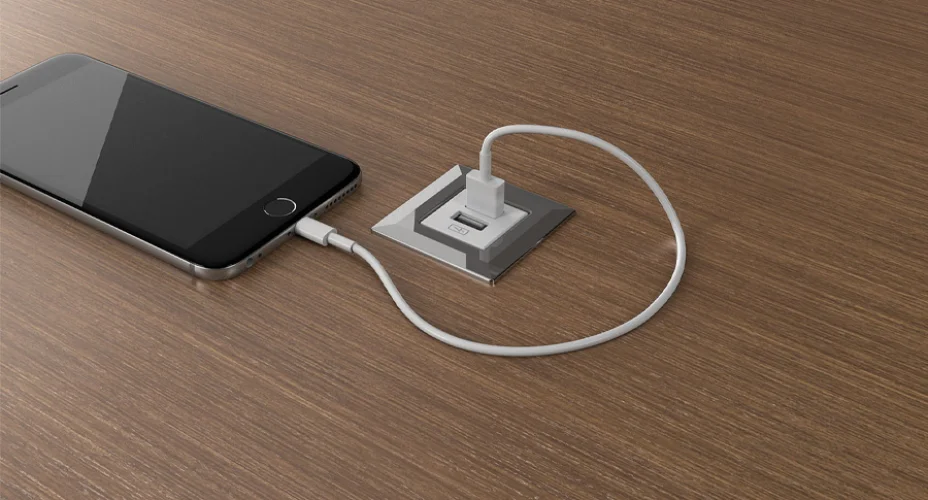 <p>This compact unit allows for the addition of power to a work surface in a discreet way. </p>